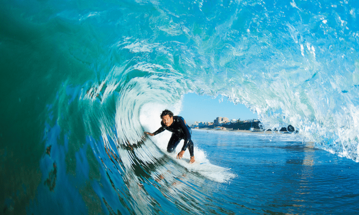 Why Do Surfers Drag Their Hand in the Wave?